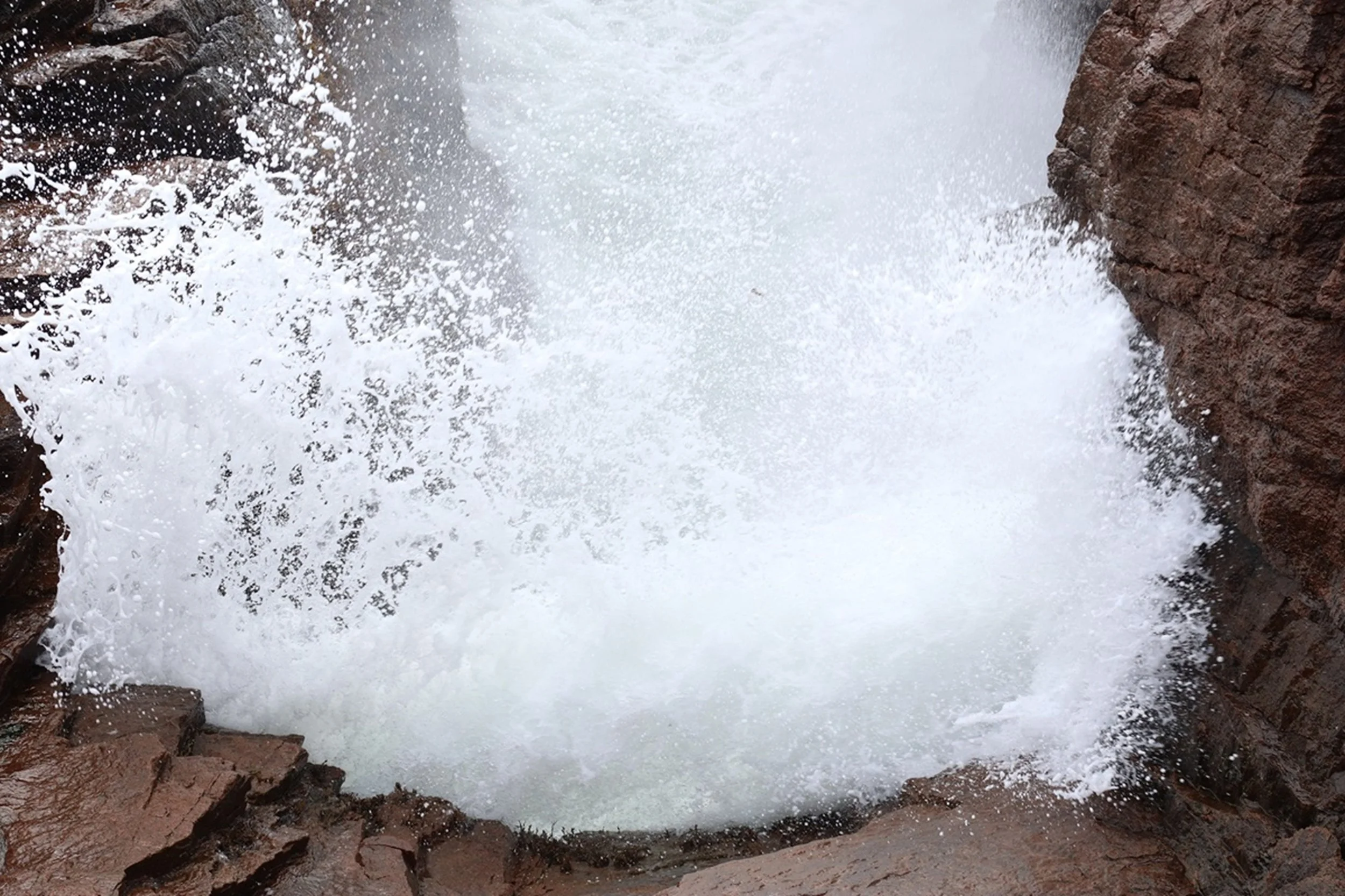 Impact: A powerful Atlantic wave explodes against granite cliffs, filling the frame with motion, texture, and energy. This dramatic composition creates a bold visual statement for resort lobbies, hospitality corridors, and public spaces seeking artwo