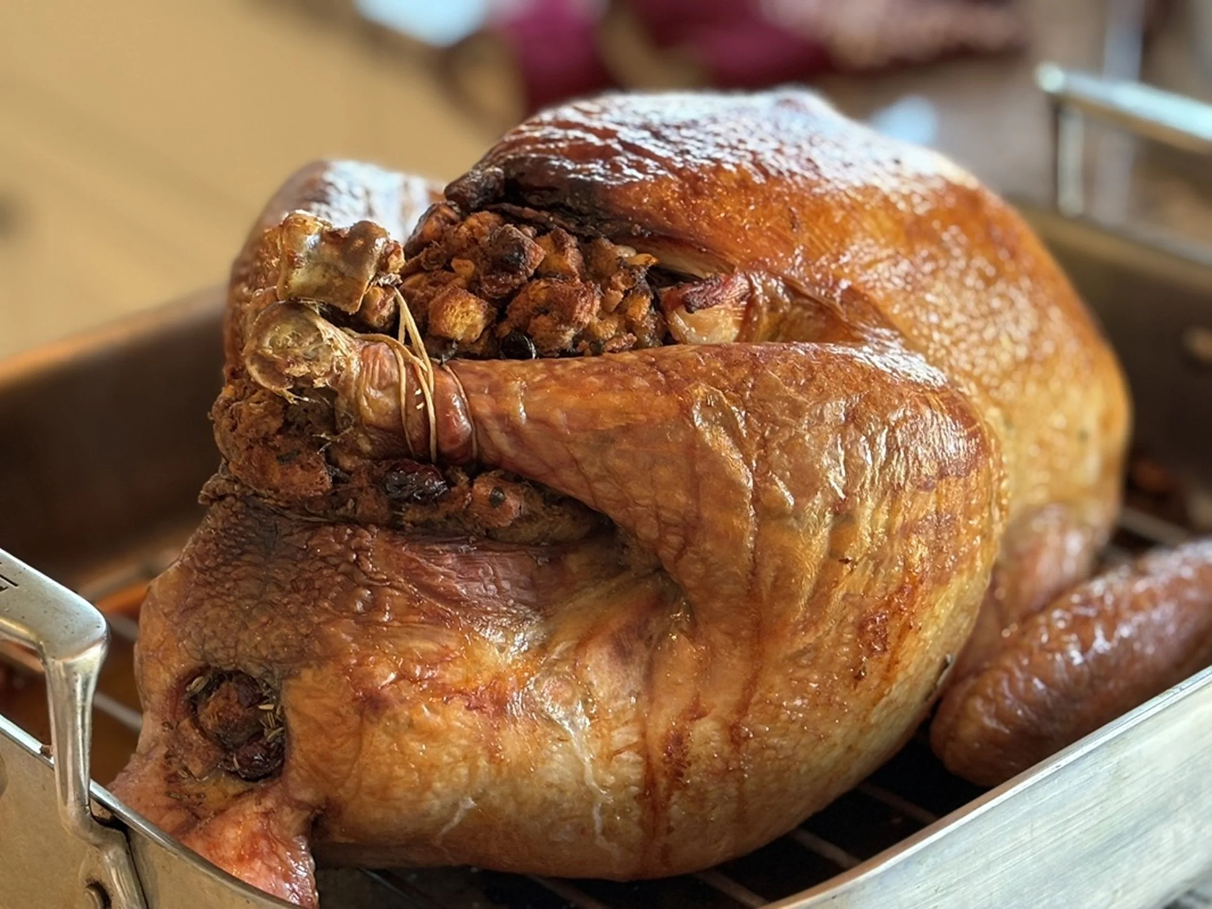 Before the First Cut: A beautifully roasted holiday turkey captures the warmth, tradition, and sense of gathering that define memorable hospitality experiences. Rich golden tones and a rustic presentation make this image ideal for boutique hotels, pr