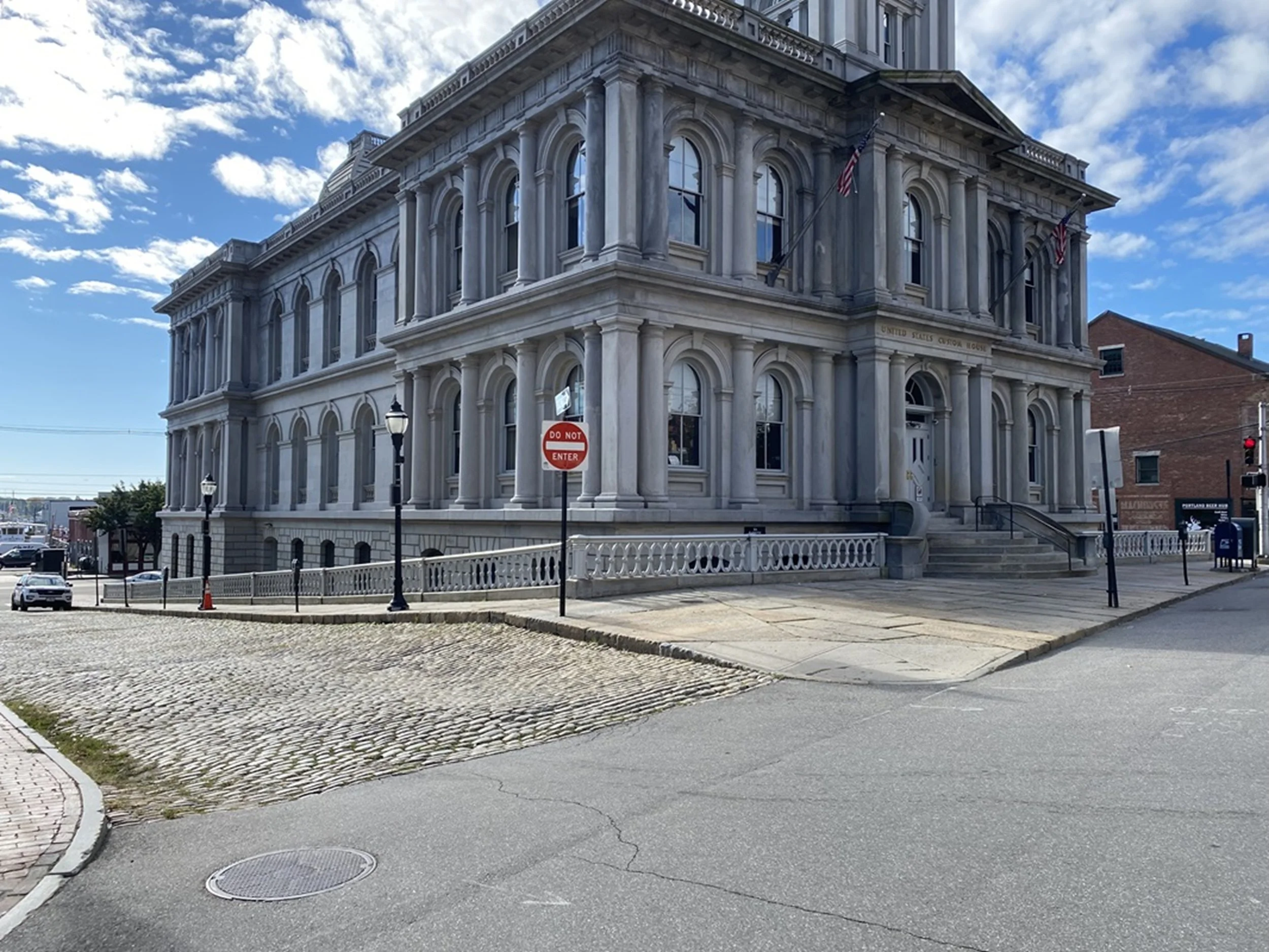 Custom House - Portland (ME) Heritage

A stately historic building anchors the corner with classical symmetry and enduring presence. The interplay of stone, light, and shadow highlights architectural craftsmanship while grounding the image in a stron