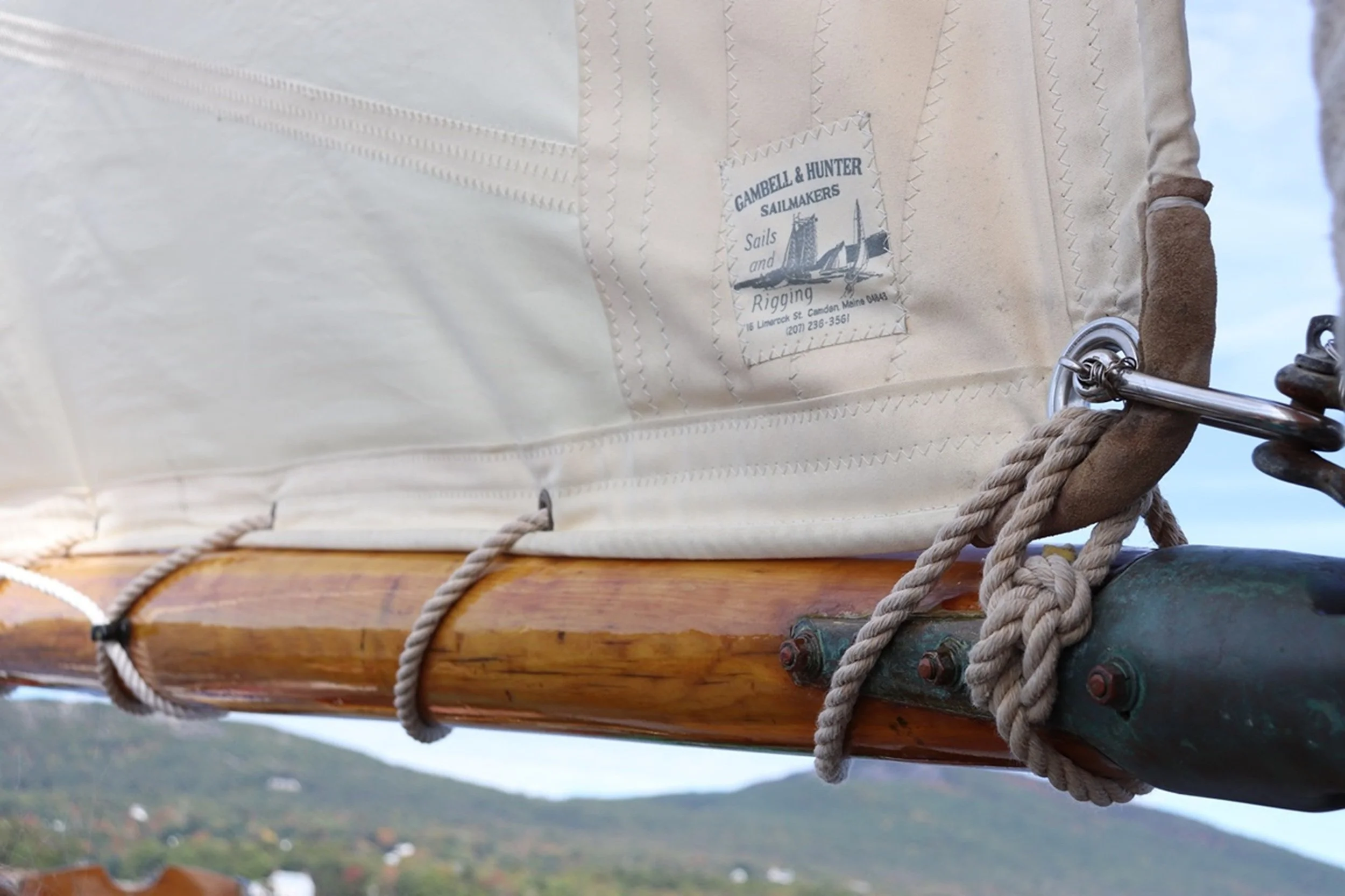 Canvas and Craft: Hand-stitched sailcloth, weathered rope, and finely finished woodwork reveal the enduring artistry behind traditional sailing craftsmanship. Rich in texture and authenticity, this image brings a sense of coastal heritage and refined