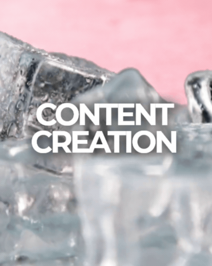 Close-up of a clear glass with ice cubes and water, with the text 'Content Creation' overlaid.