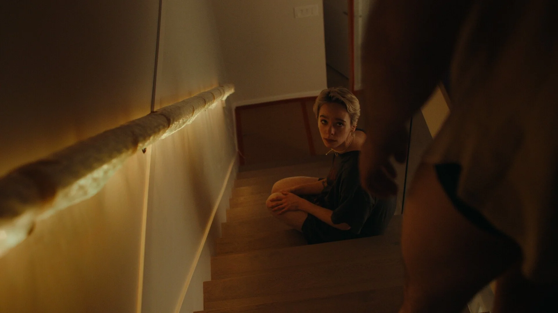 awardee_nonbinary-Jess_on_stairs.jpg