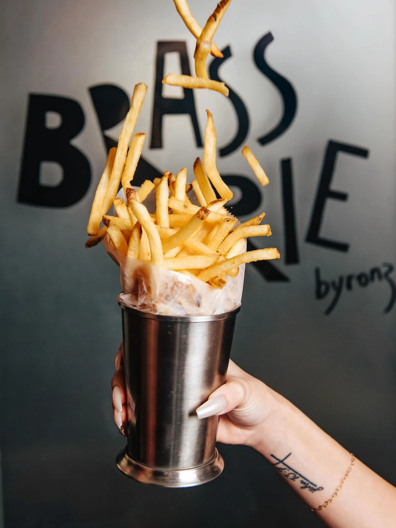 House-fried pommes frites at Brasserie Byronz - crispy French fries in Baton Rouge