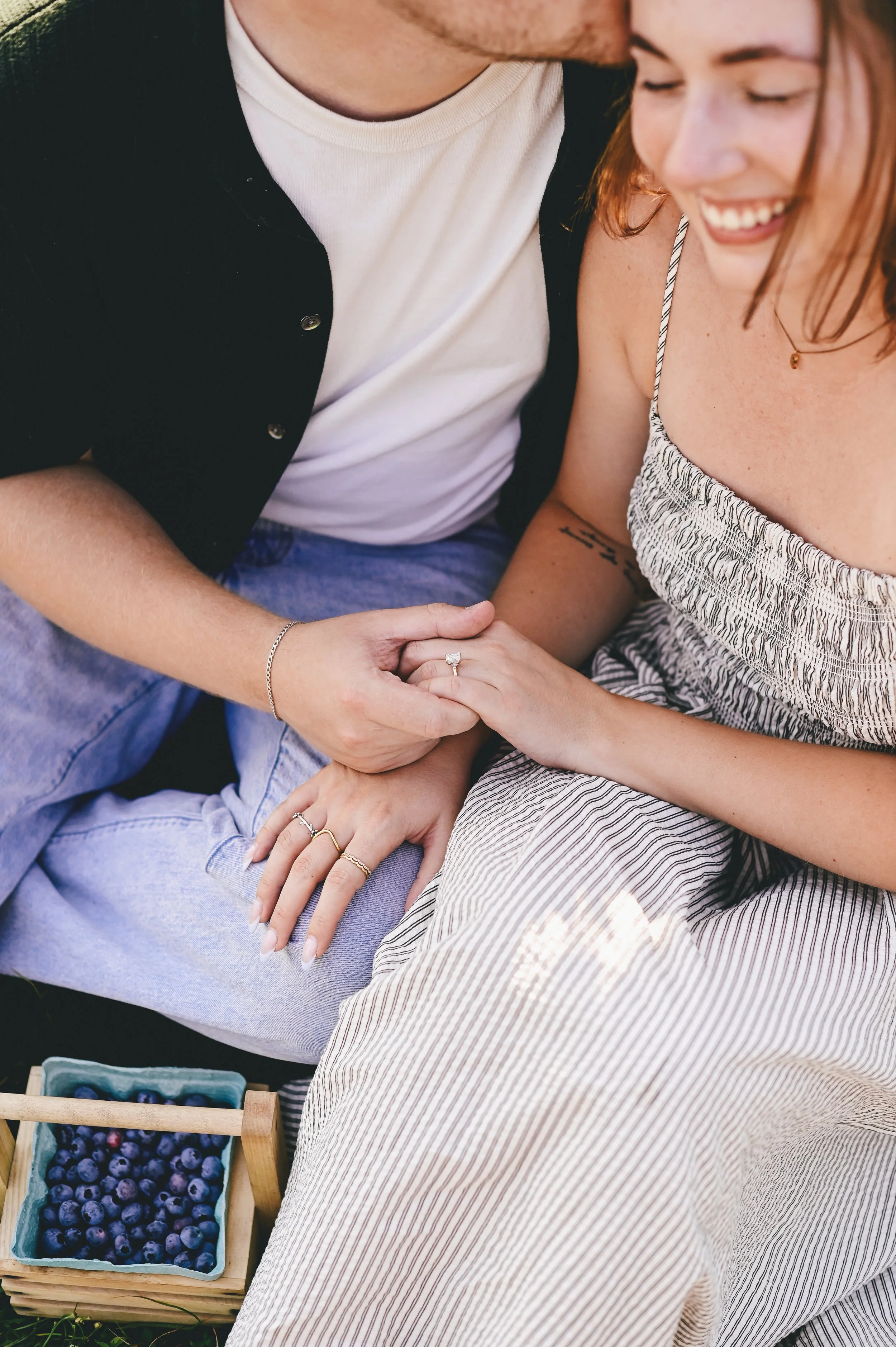 a very happy couple after a surprise proposal at a farm in southern Maine