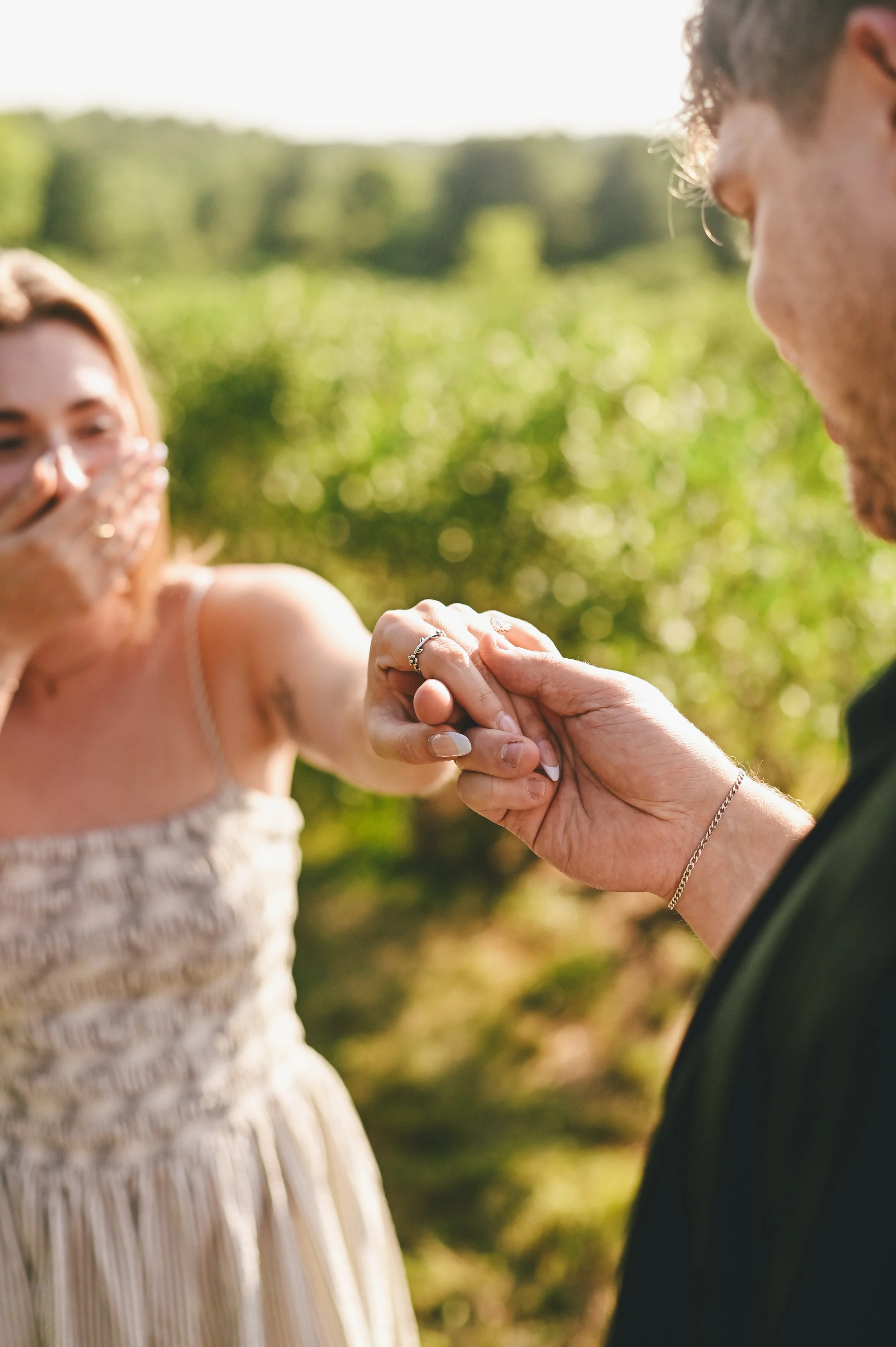 a woman very surprised after a surprise proposal in Maine