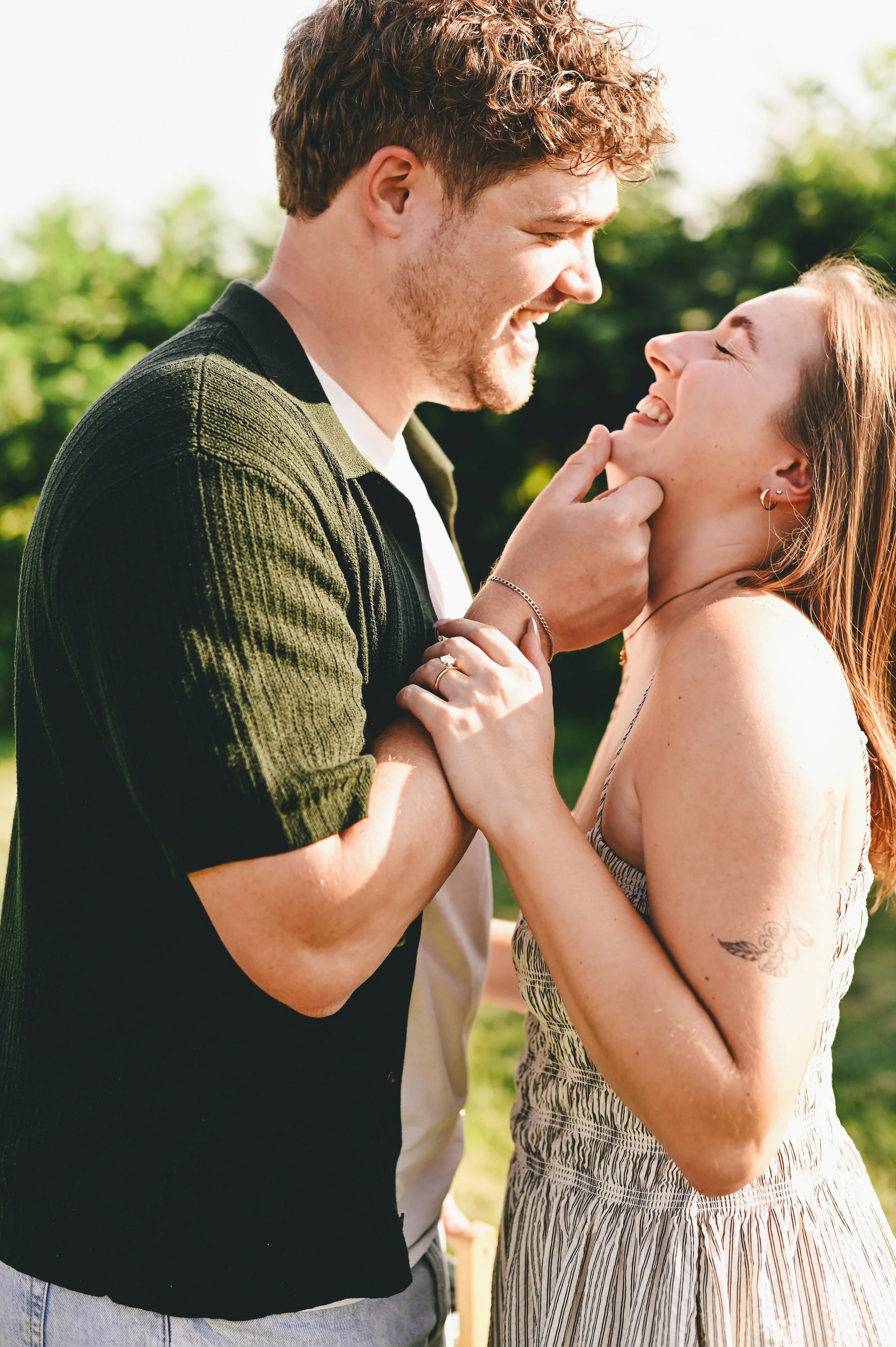 couple is ecstatic after a surprise proposal in Maine