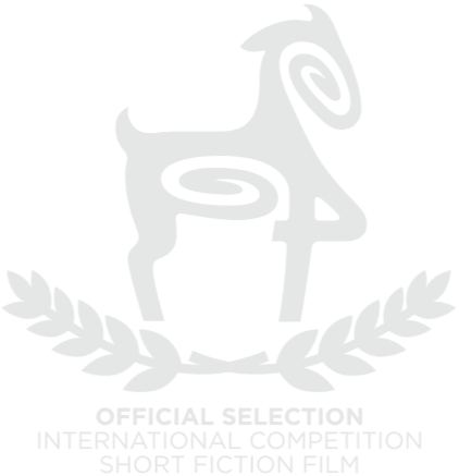 Stylized goat illustration above laurel leaves with text 'Official Selection International Competition Short Fiction Film'