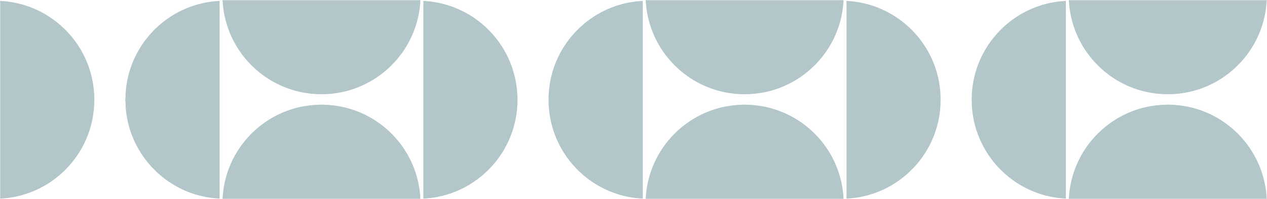 A repeating pattern of gray and black semi-circles and quarter circles arranged in a geometric design