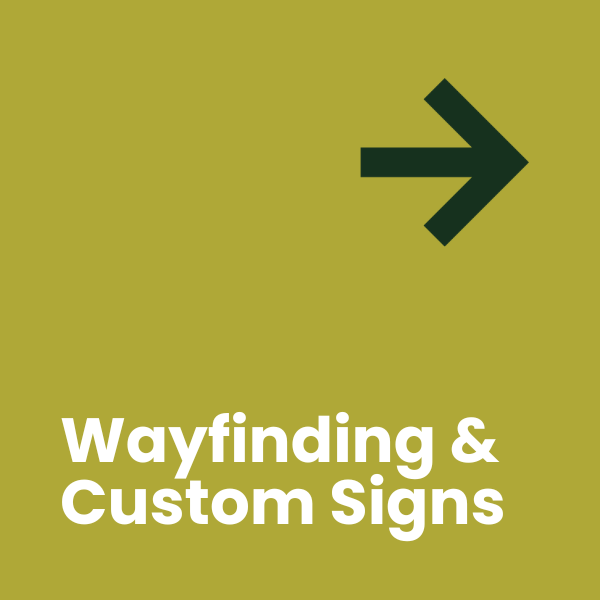 Morse & Associates  Light Green Square with Dark Green Arrow in top right corner with text that reads "Wayfinding & Custom Signs"