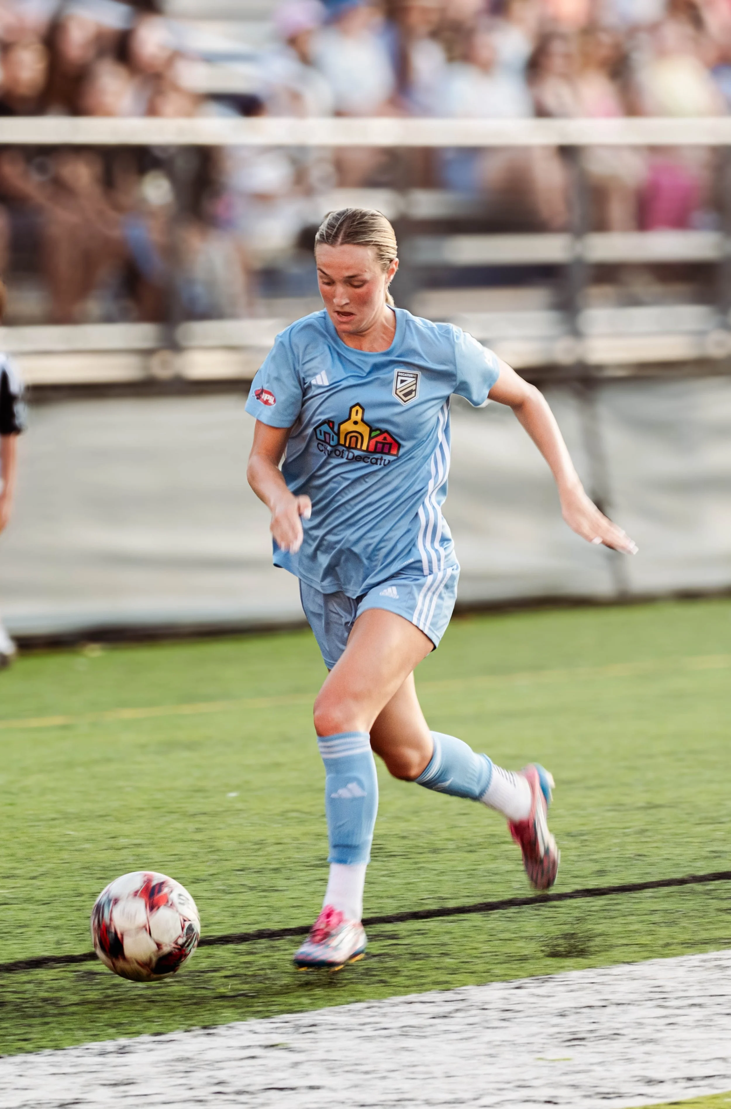 A female soccer player. wpsl soccer league. college soccer player. decatur fc