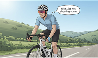 A person riding a bicycle on a rural road surrounded by green hills, wearing a helmet and sunglasses, with a speech bubble that says, 'Nice... it's not shouting at me.'