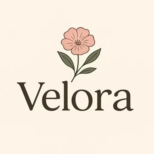 A logo featuring a pink flower with dark center and green leaves above the word 'Velora' in bold, black text on a beige background.