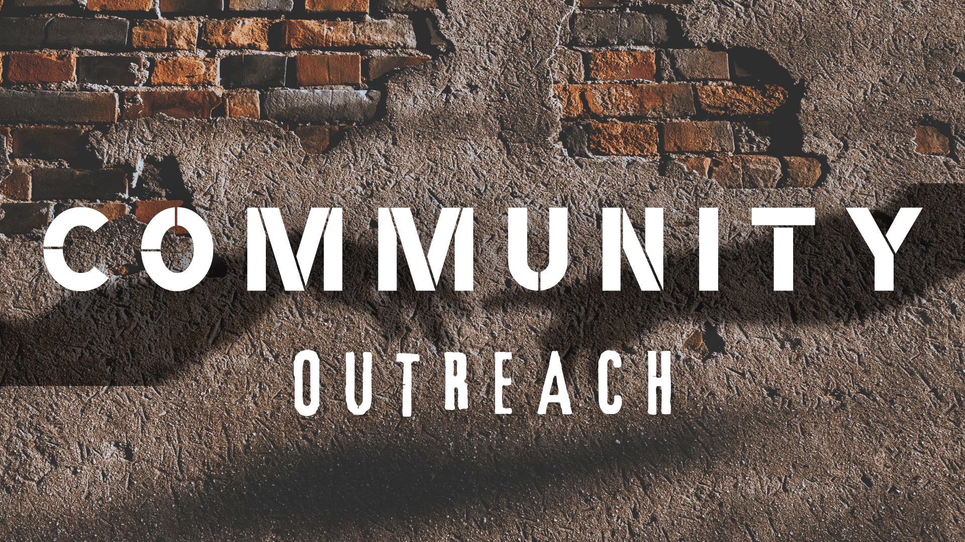 Text reading 'Community Outreach' over a textured brick wall background.