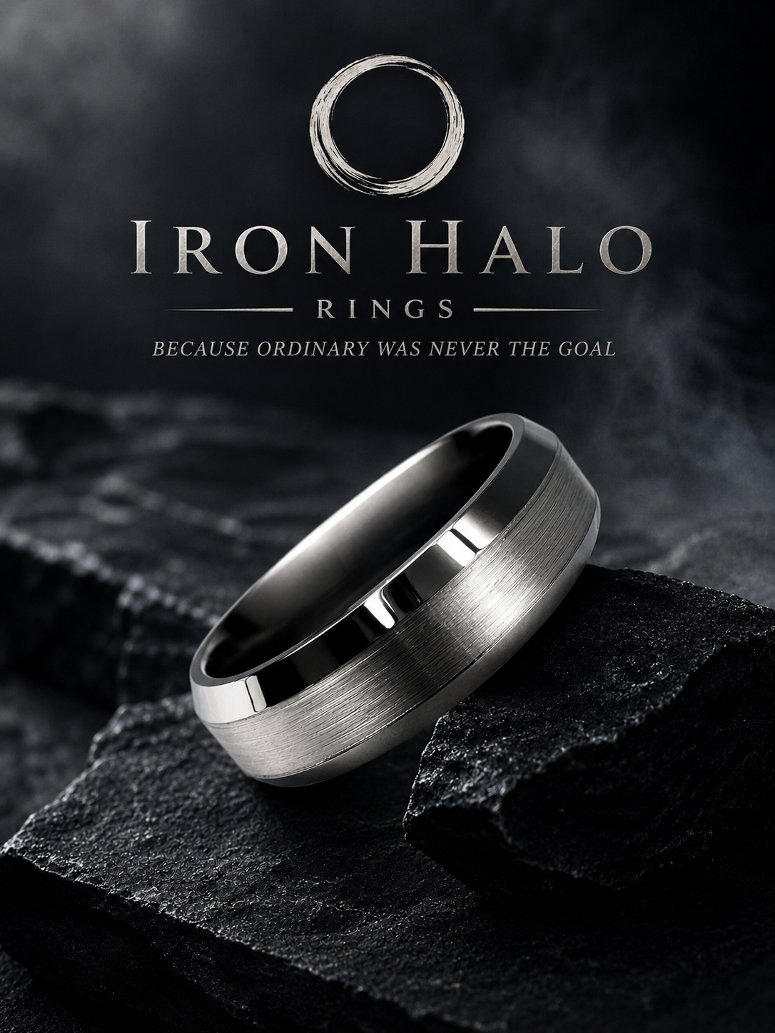 A silver metal ring with a brushed finish, displayed on a black textured surface, with branding for Iron Halo Rings and the tagline "Because ordinary was never the goal" in the background.