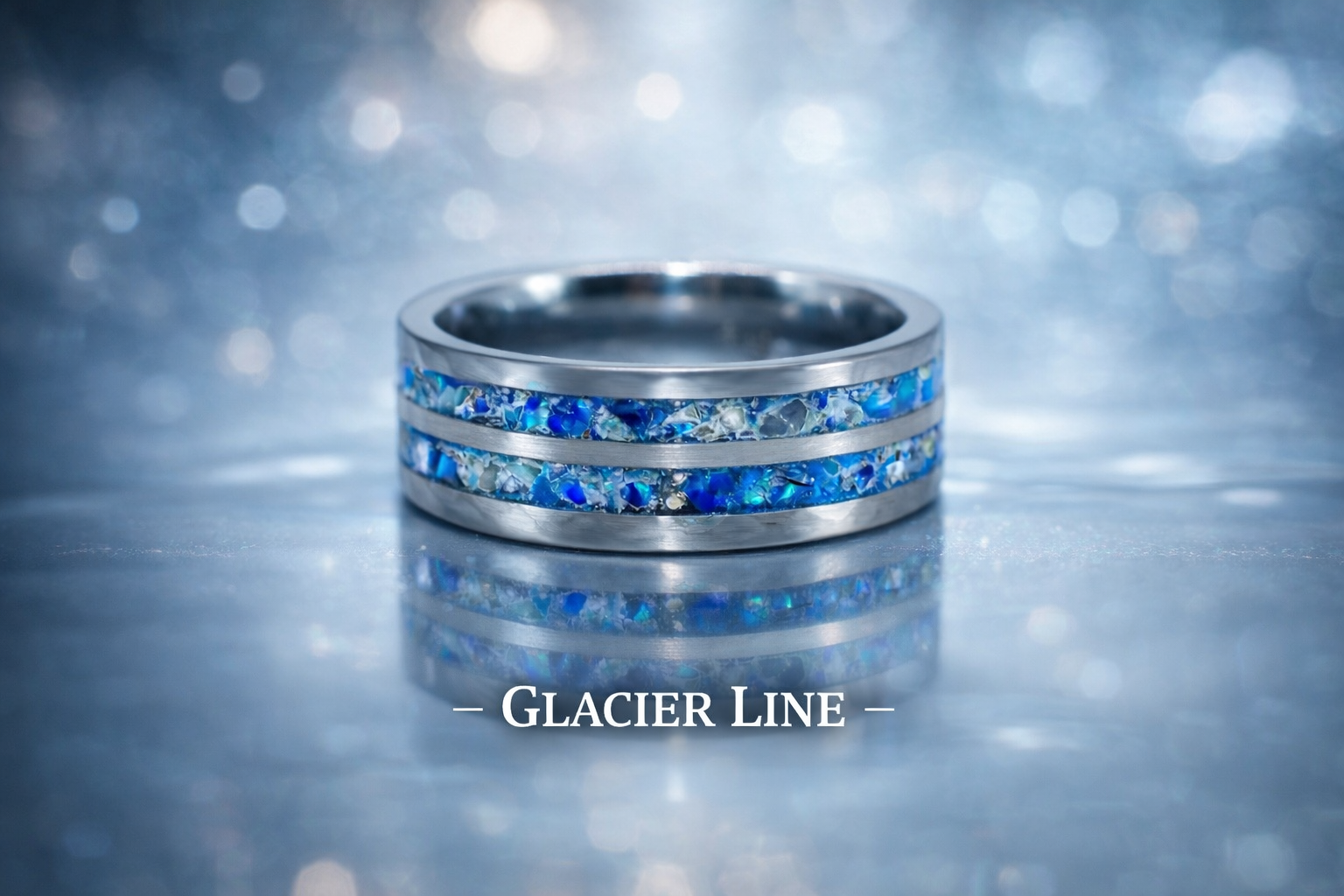 Close-up of a silver ring with blue and white gemstone inlays, on a reflective icy surface with a bokeh background, and the text 'Glacier Line' at the bottom.