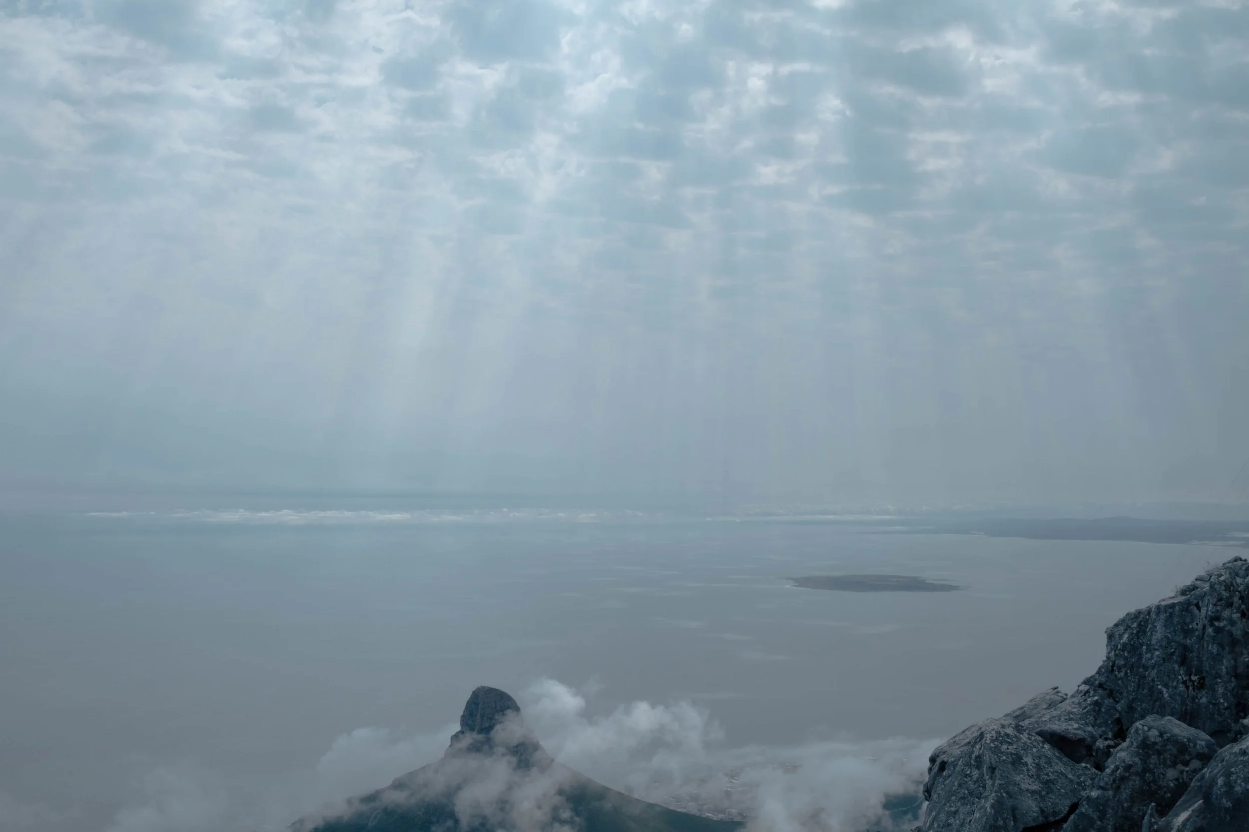 View from Table Mountain of the sun breaking through the cloud