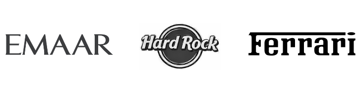 Logos of Emaar, Hard Rock, and Ferrari companies.