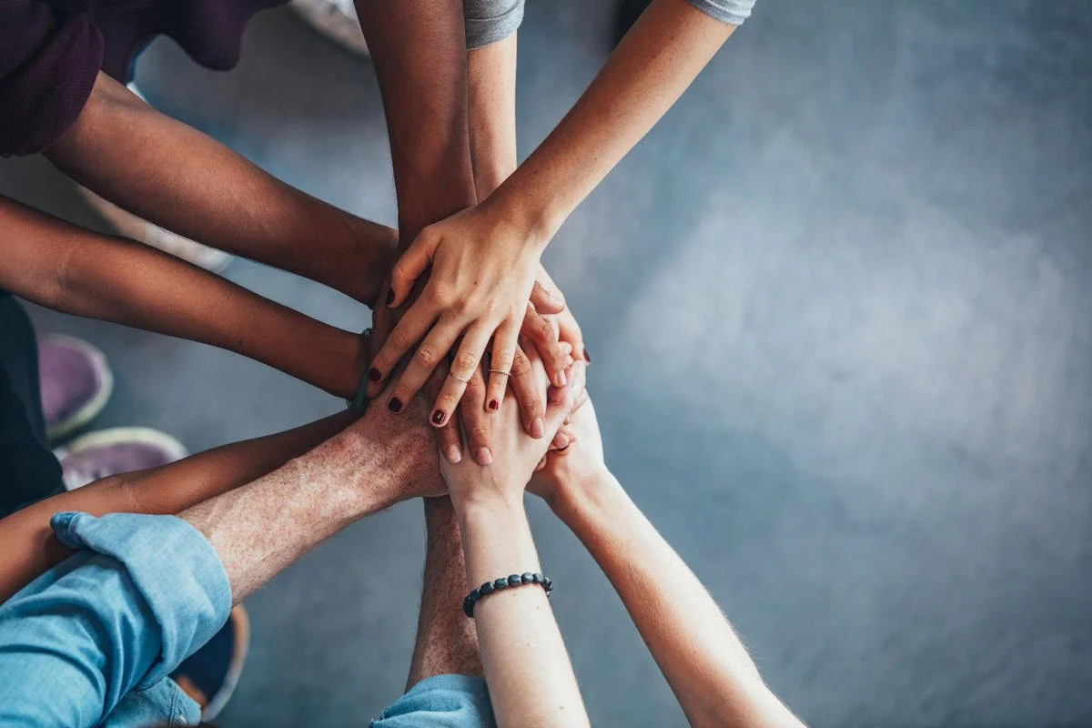 support-group-hands-together.jpg