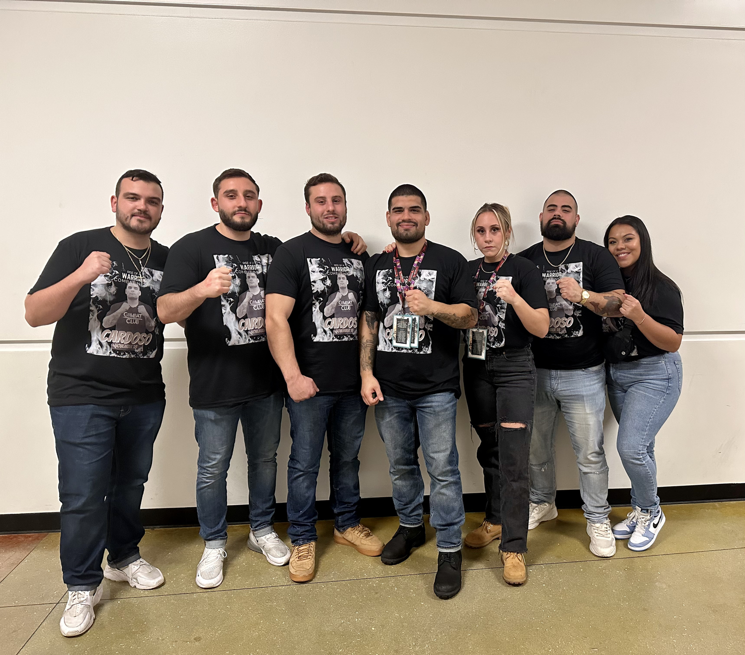 Team in matching black graphic tees