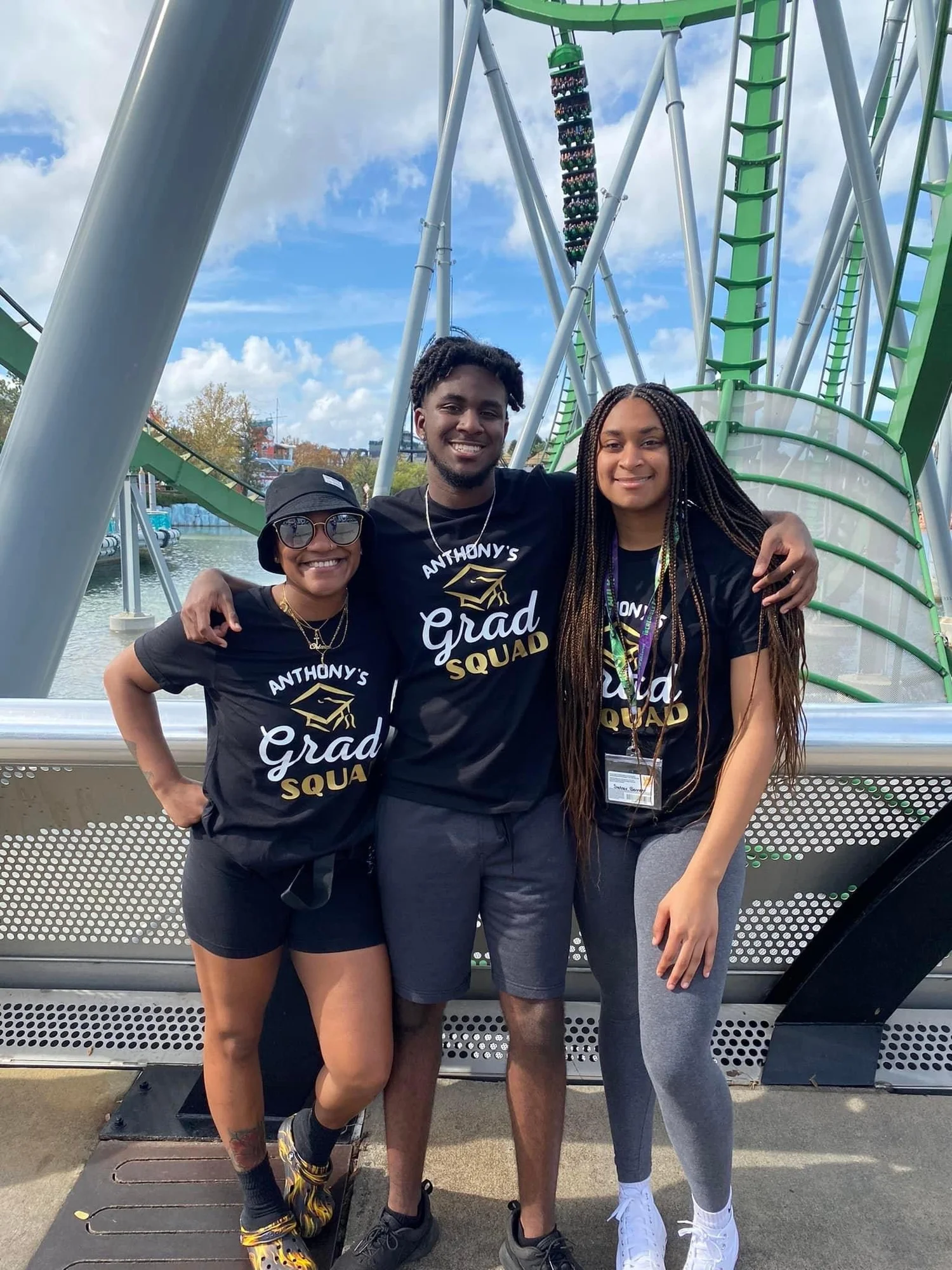 Grad Squad custom tees at a theme park