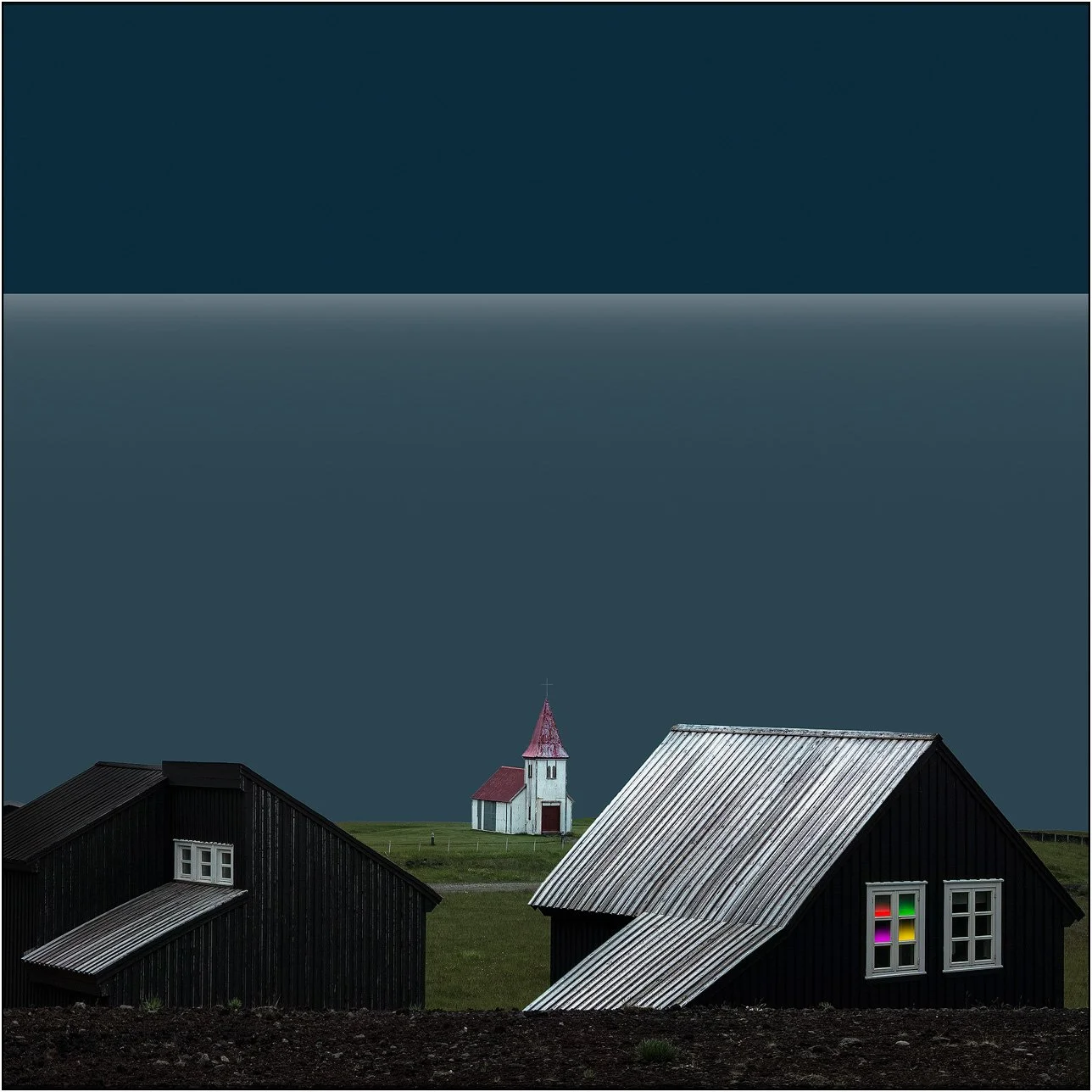 Minimal Iceland village with dark houses and a small church in the distance, featuring a softly colored window.