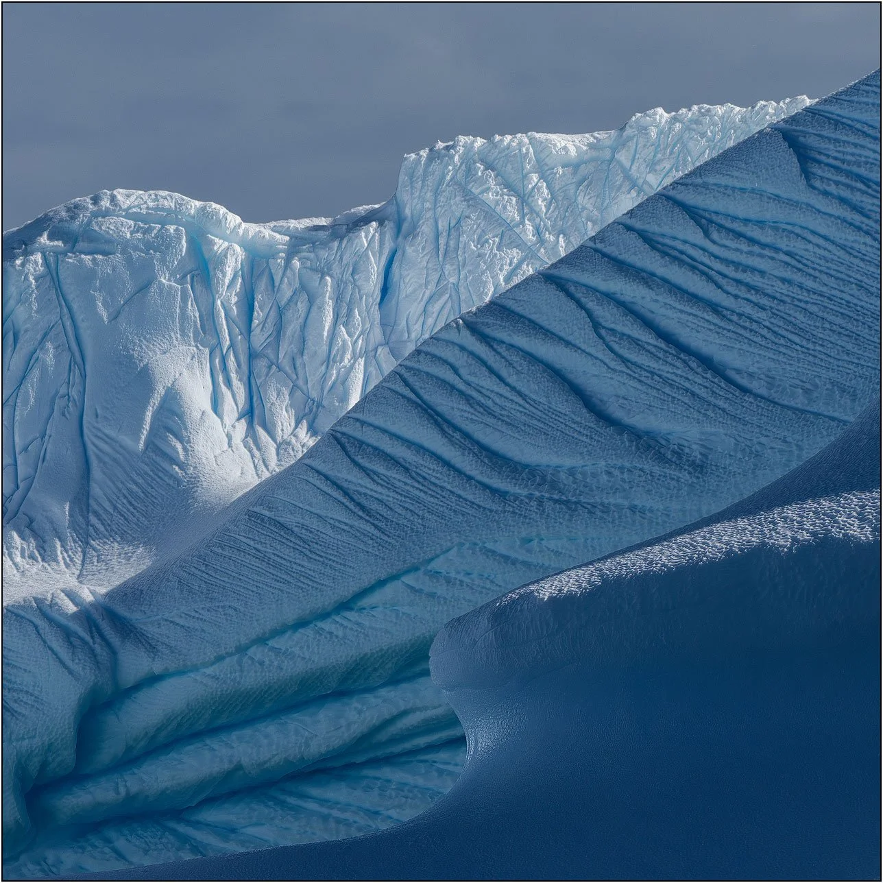 Texture details of a floating iceberg in Antarctica.