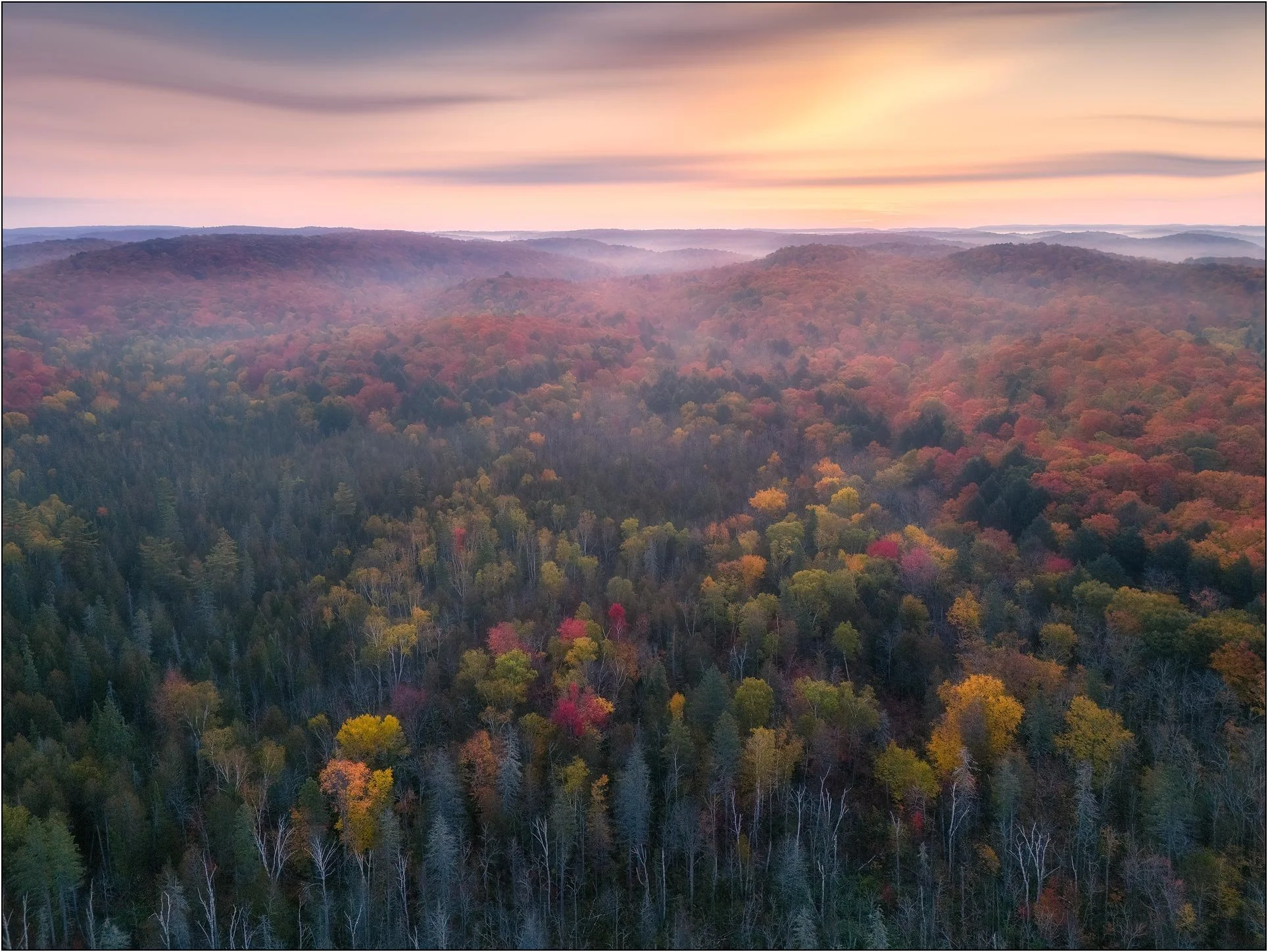 Aerial image of fall colors in Camp Adelaide, Canada.