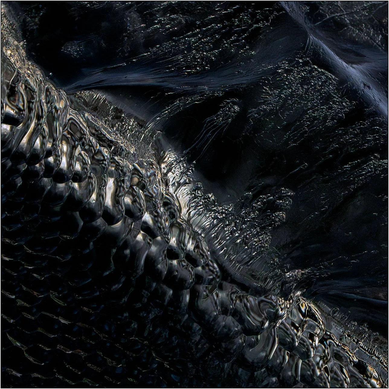 Detailed textures of black ice found in Antarctica.