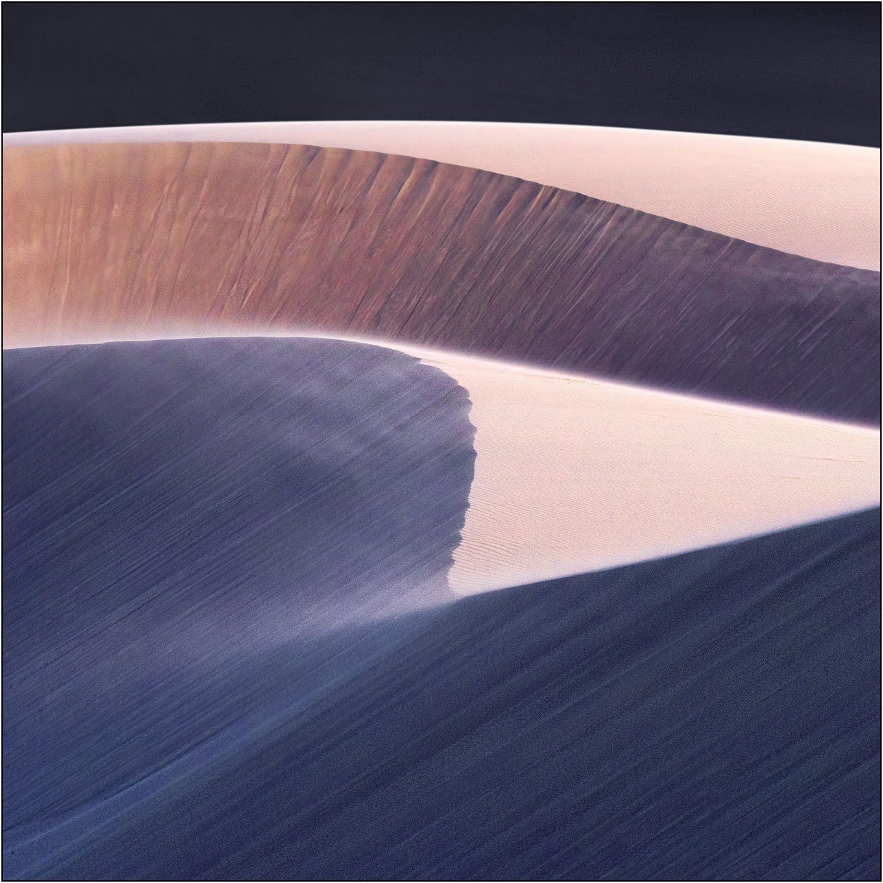 Soft pastel-toned sand dunes with smooth curves and gentle light transitions