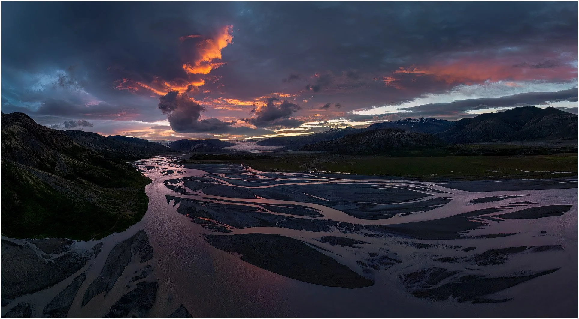 Glamorous sunset with burning clouds at a glacier river, Iceland.
