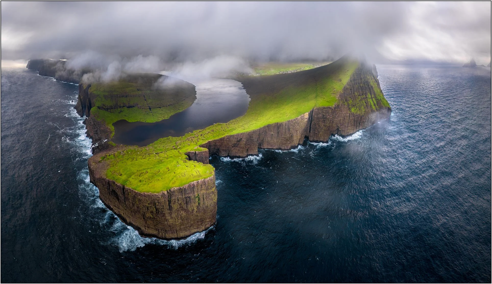 Lake above ocean, panoramic view of lake Sorvagsvatn, Vagar, Faroe Islands.