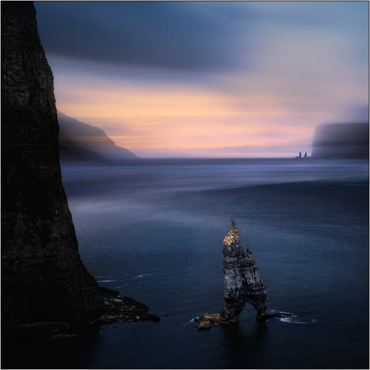 ICM (intentional camera movement) and double exposure image of Saksun beach at sunset, Faroe Islands, creating blurry and dreaming effect.