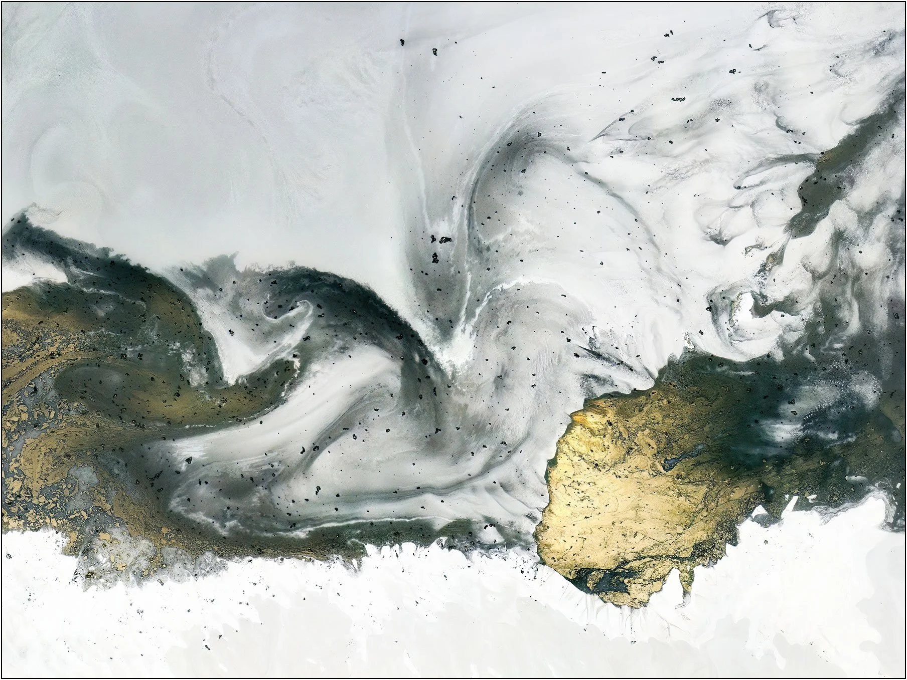 Abstract aerial composition with fluid motion and scattered textures suggesting a natural rhythm