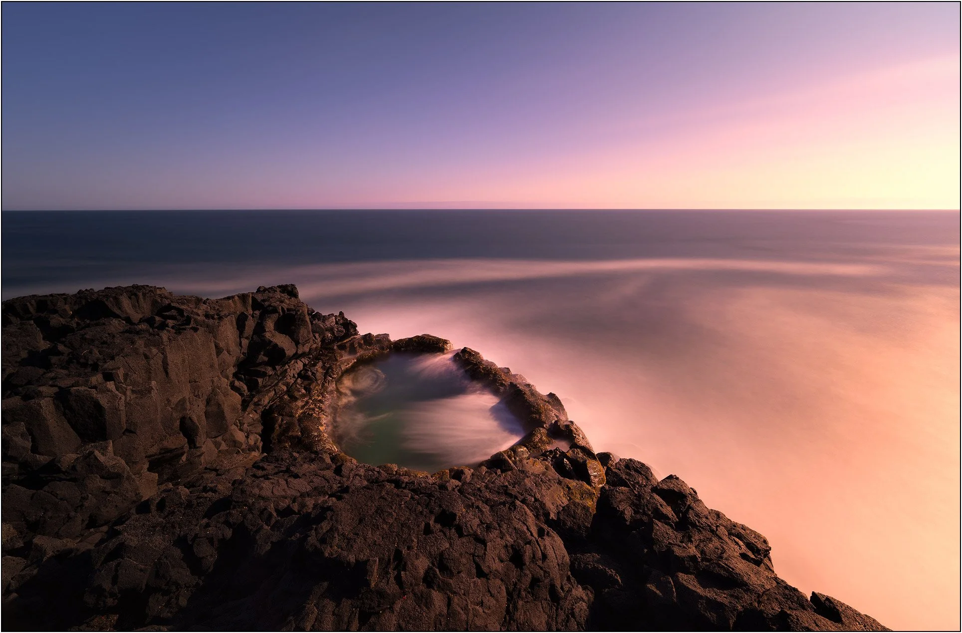 Long exposure of Lava rock pool in Iceland, creating soft and dreamy effect.