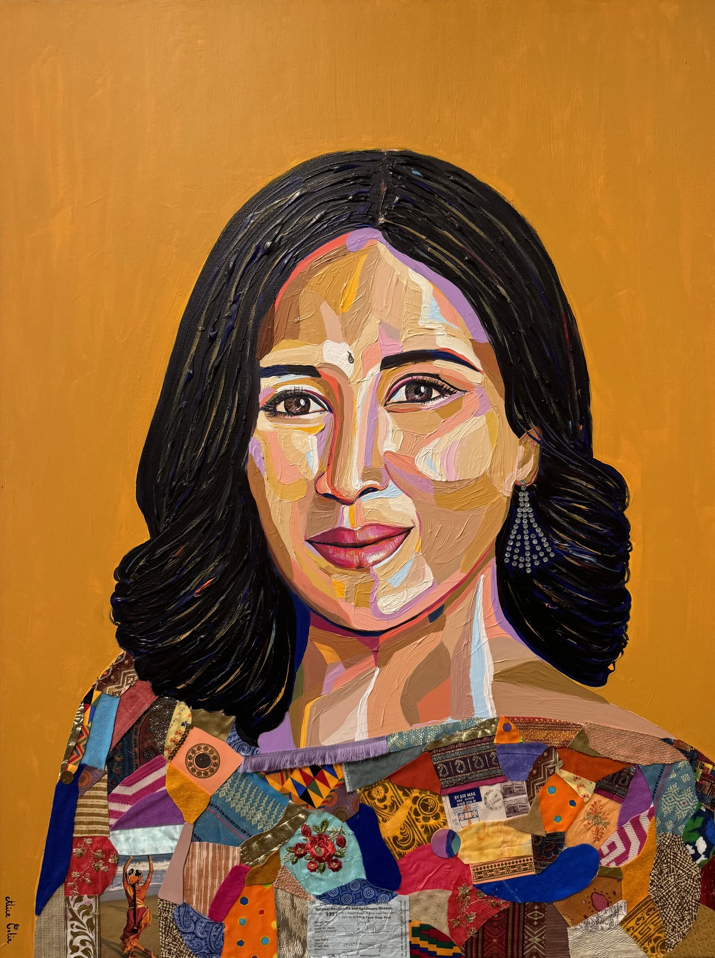 Mixed media portrait of a woman with dark hair, painted with colorful brushstrokes on an orange background, with a collage of fabric and paper at the bottom.