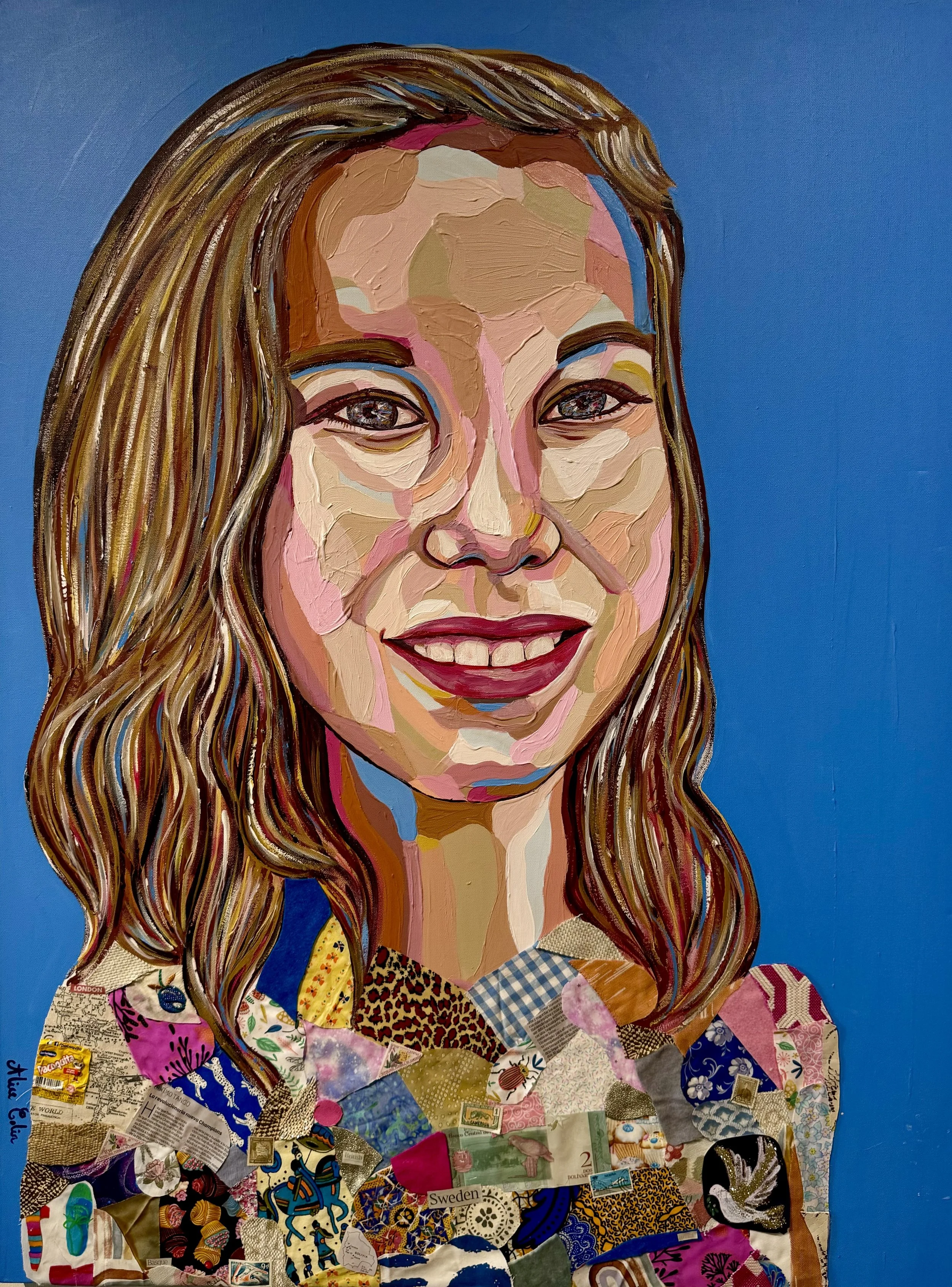 Mixed media collage portrait of a woman with long hair against a blue background, composed of various magazine clippings and painted details.