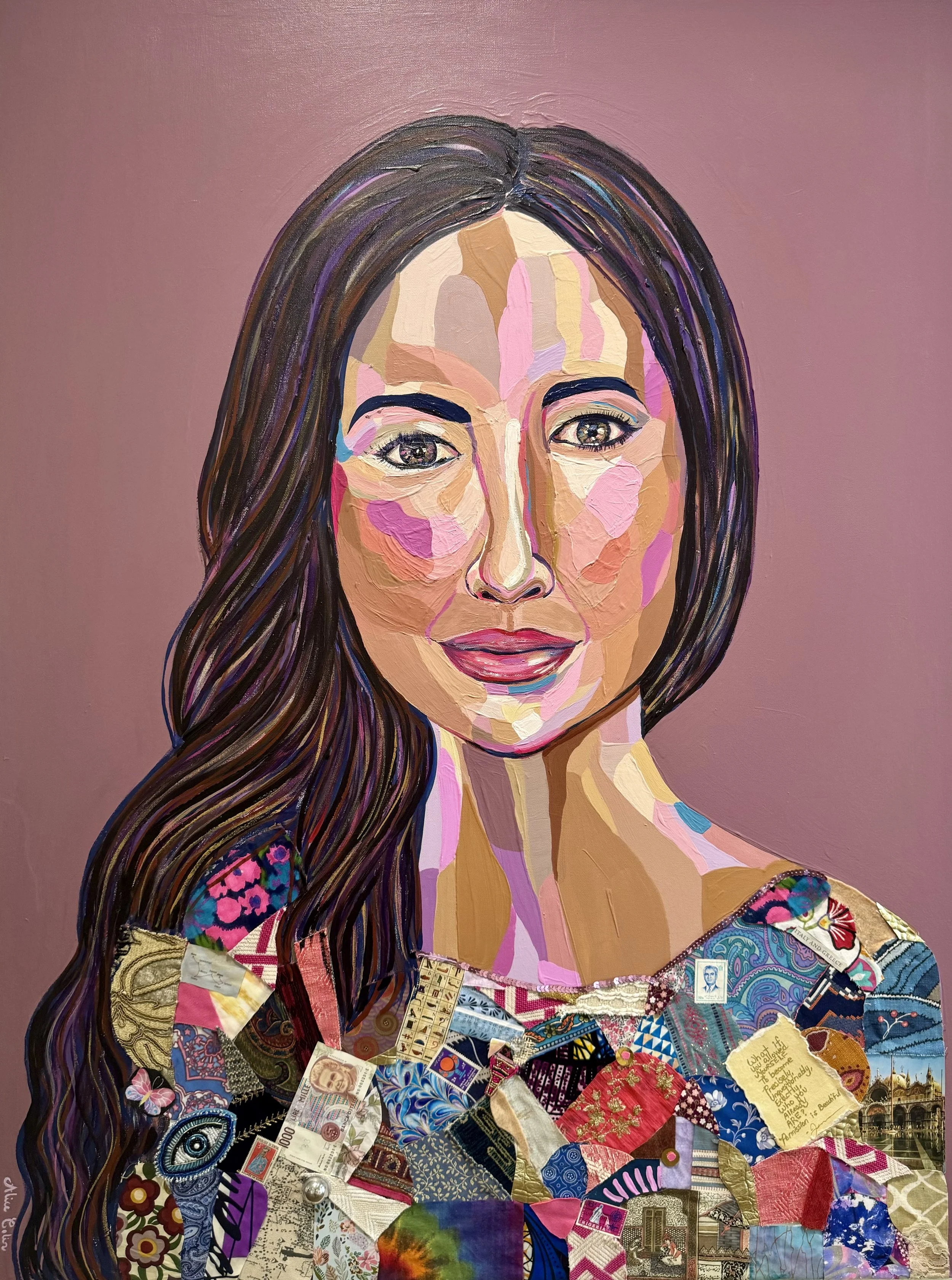 A portrait of a woman created with a collage of various colorful, patterned fabric pieces, with detailed hair and facial features, set against a plain pink background.