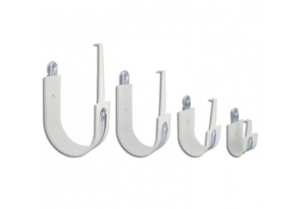 Four white J hooks of different sizes arranged from largest to smallest.