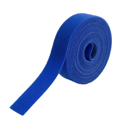 Blue velcro belt rolled up, isolated on white background.