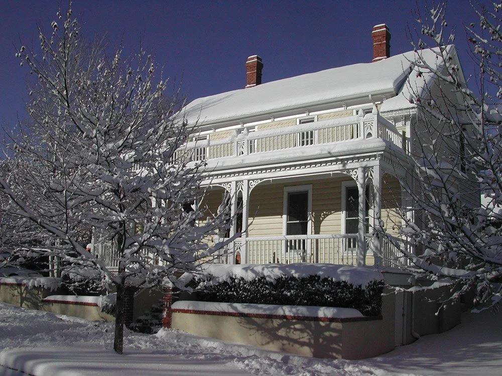snow covered Prescott house
