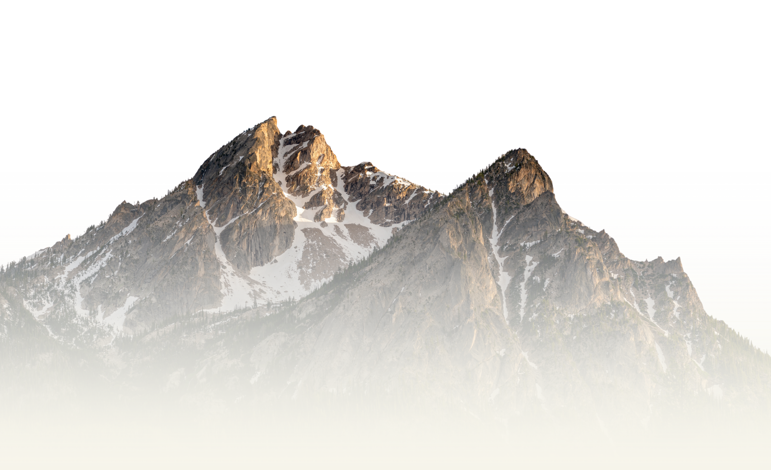 Snow-capped mountain peaks with rocky slopes, likely in a national park or mountain range, under a clear sky.