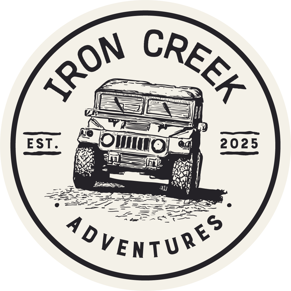 Circular logo for Iron Creek Adventures featuring a black and white illustration of a rugged off-road vehicle, with the text "Iron Creek" at the top, "Adventures" at the bottom, "EST. 2025" on either side of the vehicle, set against a white background.
