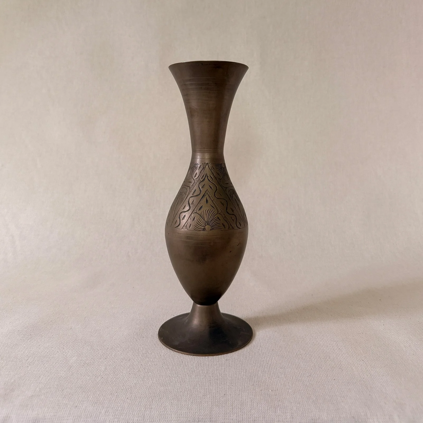 etched brass vase