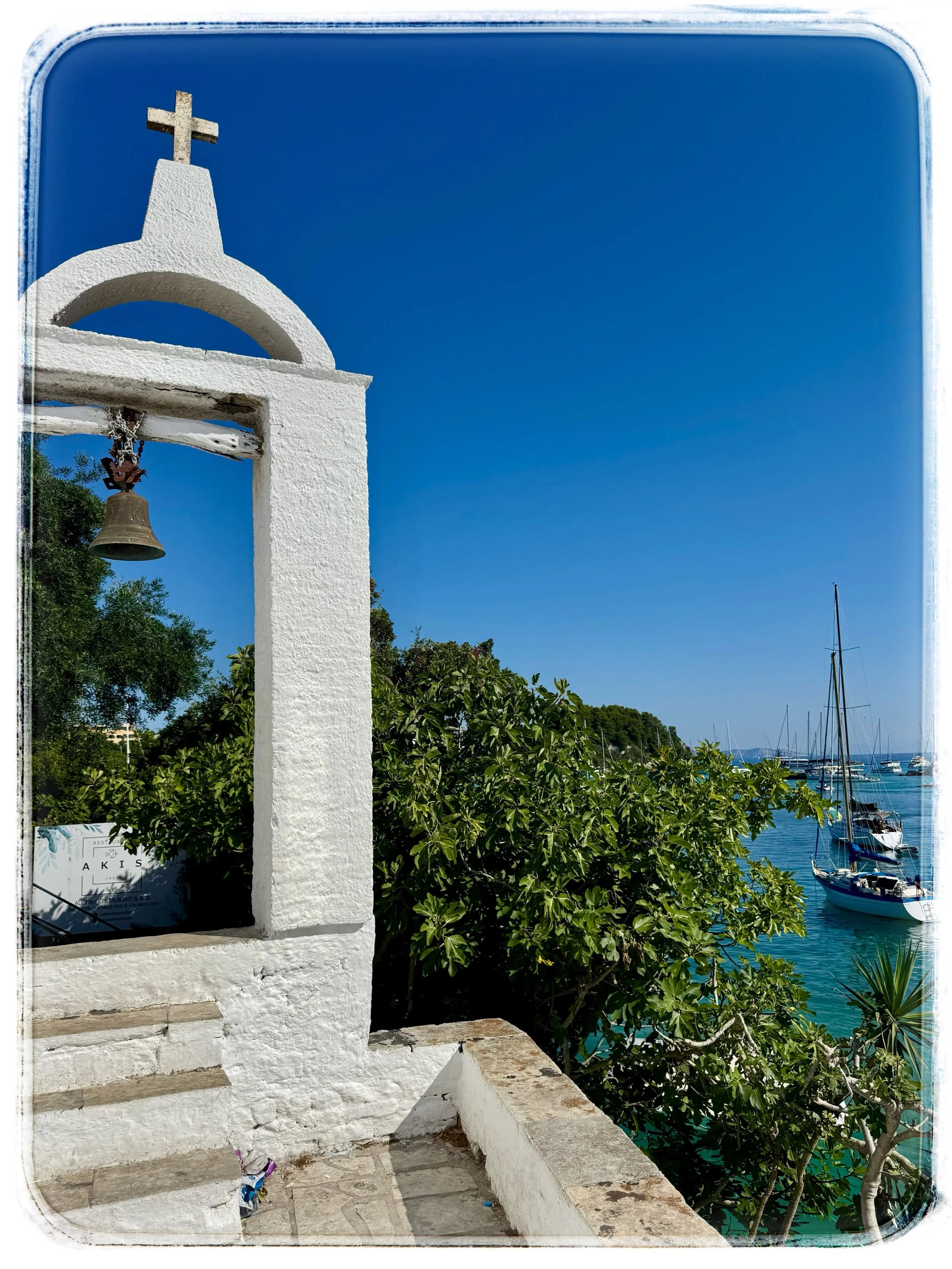 An hour or so by ferry from Corfu, the smallest of the Ionian islands in Greece takes a little effort to reach, and that&rsquo;s precisely its charm. There&rsquo;s no airport and no rush here. 

Paxos is understated, a little imperfect, and content t