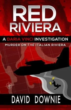 Book cover titled 'Red Riviera: A Daria Vinci Investigation' by David Downie, featuring a silhouette of a person falling into water with an airplane and a red-toned map background. Book & Author Publicity by Quatrain PR.