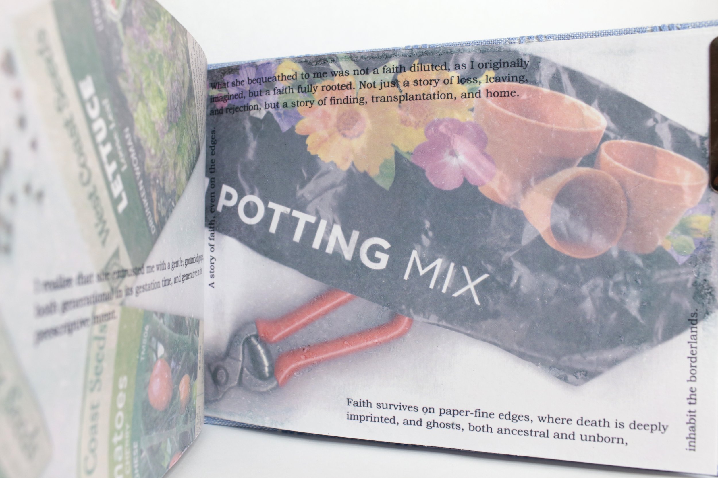 Close-up of a gardening book titled "POTTING MIX" with colorful flowers on the cover, partially open showing some text about faith and transplantation.