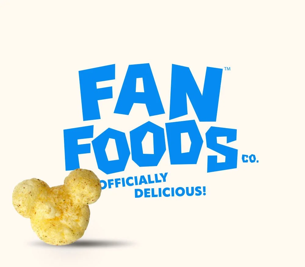 A logo for Fan Foods Co. with the slogan 'Officially Delicious!' and an image of a Disney Mickey Mouse shaped veggie puff snack.