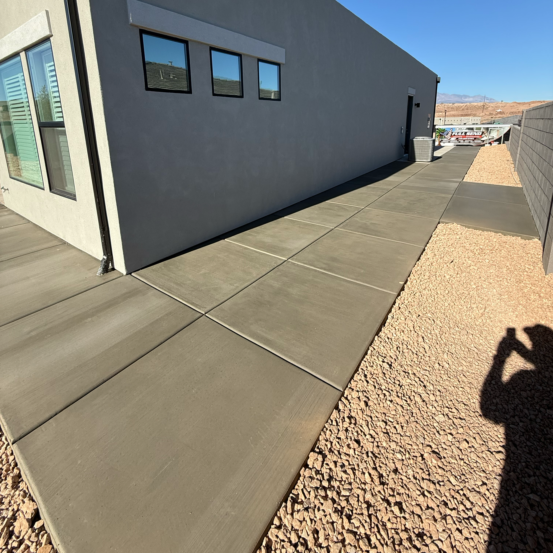Concrete trash can pad installation by Full Send Concrete in St George Utah