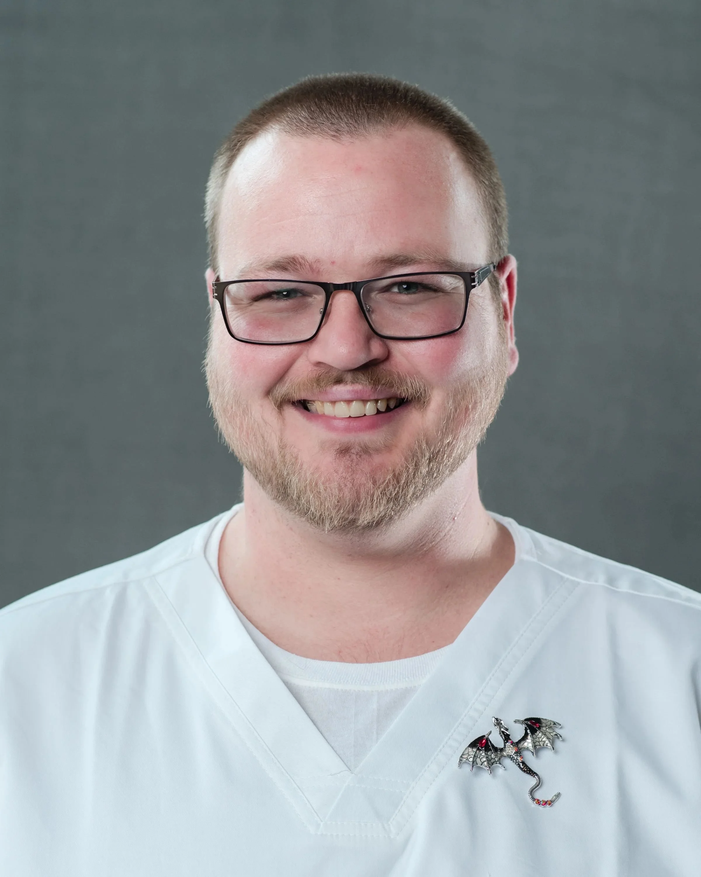 Jeffrey appears. Wearing his dragon nurse pin. Smiling bright as this is his beginning. First Aid training