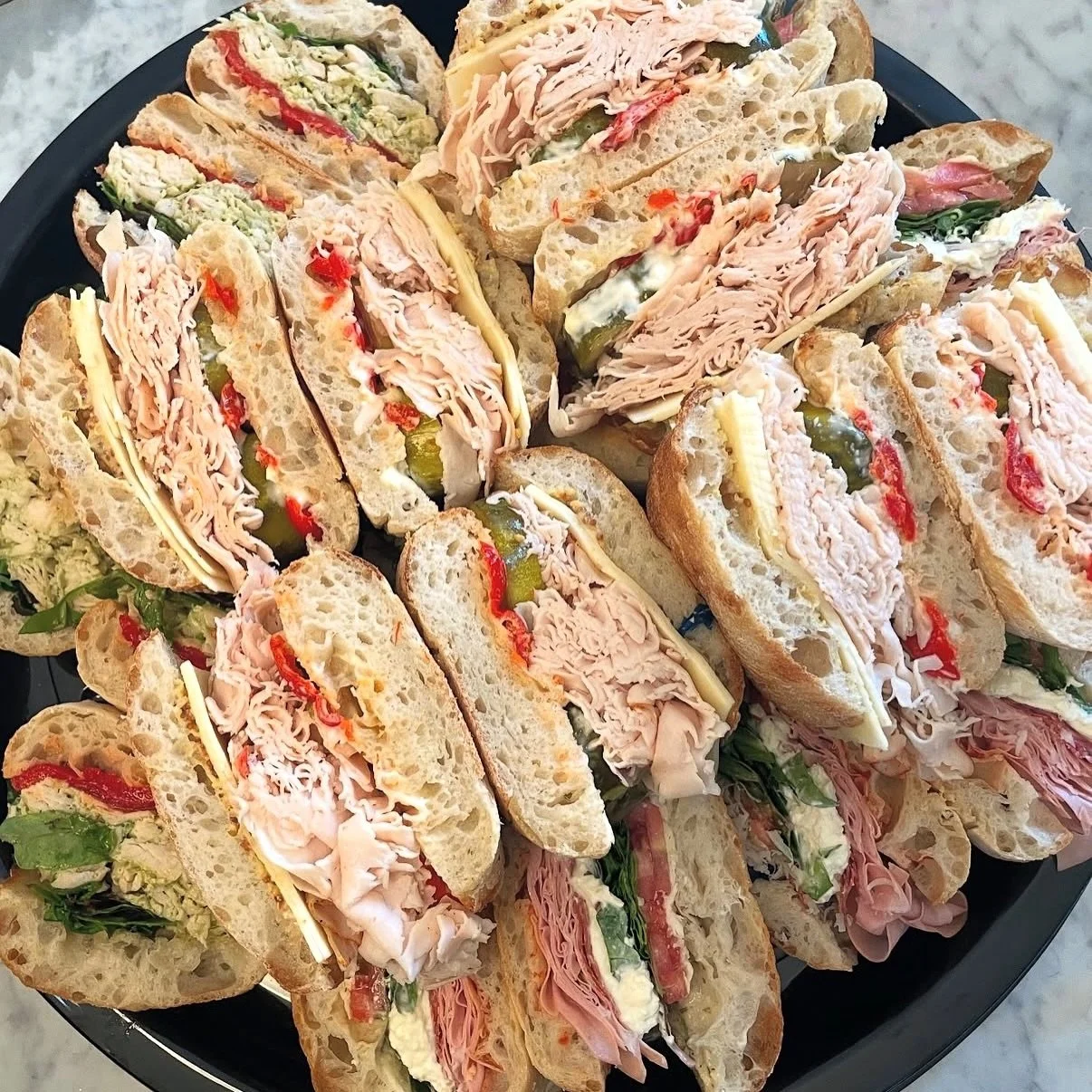 Catering from The Pass can solve a surprising number of problems..

Low office morale.
Hungry boat crews.
Last-minute party planning.
That one family member from out of town who won&rsquo;t stop asking &ldquo;So&hellip; what&rsquo;s the food situatio